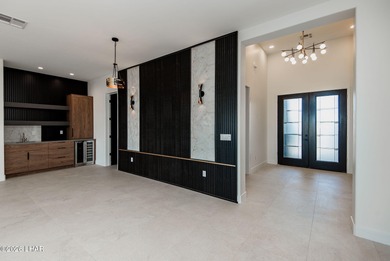 Experience modern luxury and energy-efficient living in this on Los Lagos Golf Club in Arizona - for sale on GolfHomes.com, golf home, golf lot