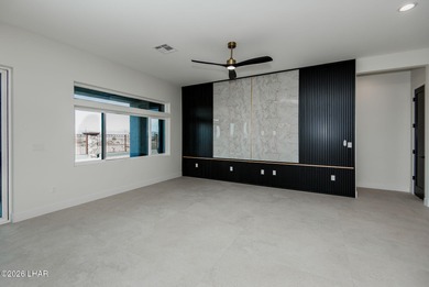 Experience modern luxury and energy-efficient living in this on Los Lagos Golf Club in Arizona - for sale on GolfHomes.com, golf home, golf lot