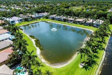 Beautifully renovated single story home available in Ballenisles on BallenIsles Golf and Country Club in Florida - for sale on GolfHomes.com, golf home, golf lot