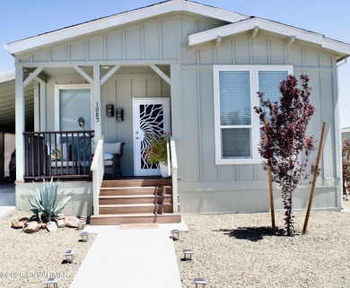 Welcome to this immaculate Gold Standard Coronado model home -- on Pine Shadows Golf Course in Arizona - for sale on GolfHomes.com, golf home, golf lot