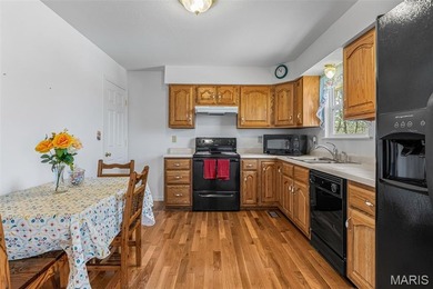 Welcome to this spacious 4-bedroom, 3-bath home located in the on Terre Du Lac Golf and Country Club in Missouri - for sale on GolfHomes.com, golf home, golf lot