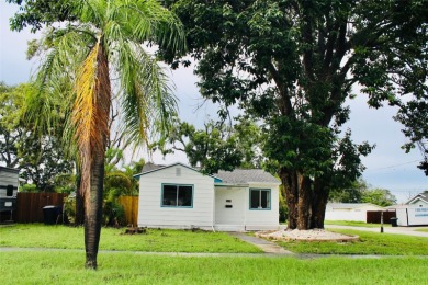 Nestled in the tranquil Edgemoor Estates neighborhood, this cozy on Mangrove Bay Golf Course in Florida - for sale on GolfHomes.com, golf home, golf lot