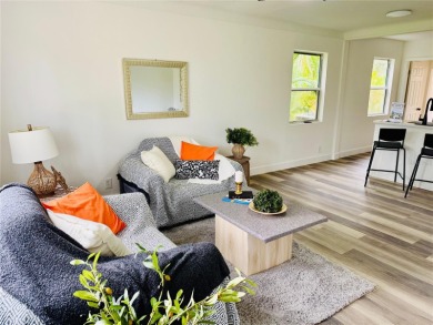 Nestled in the tranquil Edgemoor Estates neighborhood, this cozy on Mangrove Bay Golf Course in Florida - for sale on GolfHomes.com, golf home, golf lot