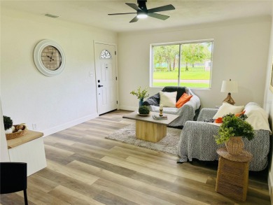 Nestled in the tranquil Edgemoor Estates neighborhood, this cozy on Mangrove Bay Golf Course in Florida - for sale on GolfHomes.com, golf home, golf lot