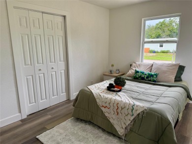 Nestled in the tranquil Edgemoor Estates neighborhood, this cozy on Mangrove Bay Golf Course in Florida - for sale on GolfHomes.com, golf home, golf lot