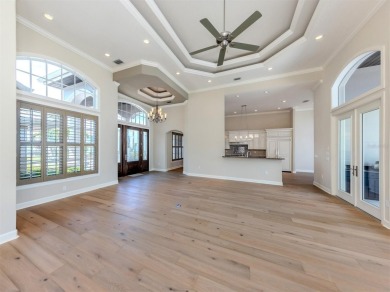 One or more photo(s) has been virtually staged. Waterfront on Bird Bay Executive Golf Club in Florida - for sale on GolfHomes.com, golf home, golf lot