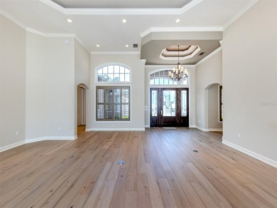 One or more photo(s) has been virtually staged. Waterfront on Bird Bay Executive Golf Club in Florida - for sale on GolfHomes.com, golf home, golf lot