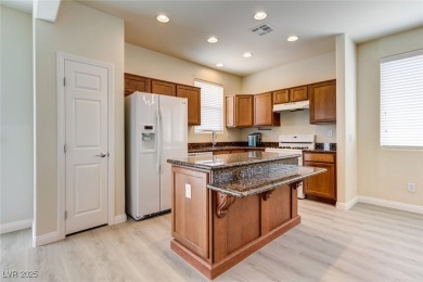 Charming 2 stories,3 bedrooms, 2 car garages in guard gate golf on Rhodes Ranch Golf Club in Nevada - for sale on GolfHomes.com, golf home, golf lot