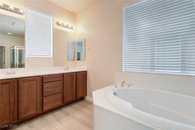 Charming 2 stories,3 bedrooms, 2 car garages in guard gate golf on Rhodes Ranch Golf Club in Nevada - for sale on GolfHomes.com, golf home, golf lot