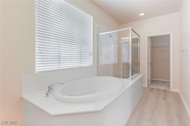 Charming 2 stories,3 bedrooms, 2 car garages in guard gate golf on Rhodes Ranch Golf Club in Nevada - for sale on GolfHomes.com, golf home, golf lot