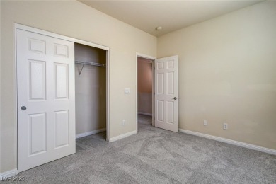 Charming 2 stories,3 bedrooms, 2 car garages in guard gate golf on Rhodes Ranch Golf Club in Nevada - for sale on GolfHomes.com, golf home, golf lot