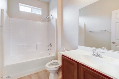 Charming 2 stories,3 bedrooms, 2 car garages in guard gate golf on Rhodes Ranch Golf Club in Nevada - for sale on GolfHomes.com, golf home, golf lot