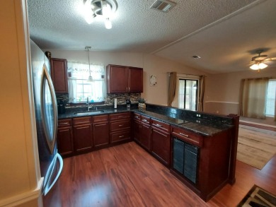 This beautiful home is loaded with upgrades. Both bathrooms have on Lakes at Leesburg Golf Course in Florida - for sale on GolfHomes.com, golf home, golf lot
