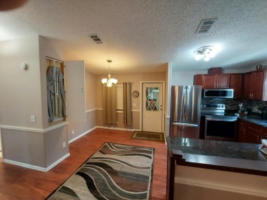 This beautiful home is loaded with upgrades. Both bathrooms have on Lakes at Leesburg Golf Course in Florida - for sale on GolfHomes.com, golf home, golf lot