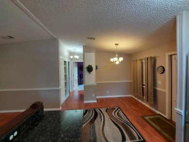 This beautiful home is loaded with upgrades. Both bathrooms have on Lakes at Leesburg Golf Course in Florida - for sale on GolfHomes.com, golf home, golf lot