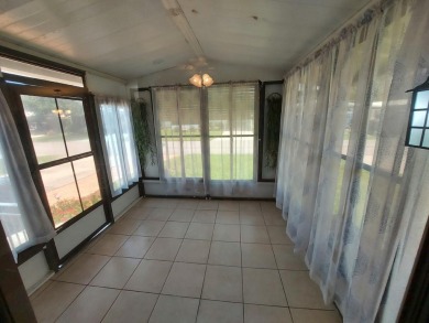 This beautiful home is loaded with upgrades. Both bathrooms have on Lakes at Leesburg Golf Course in Florida - for sale on GolfHomes.com, golf home, golf lot