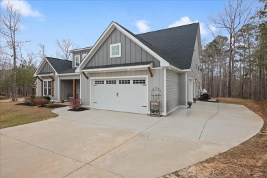 Beautiful 4-bedroom 3.5 bathrooms Waterfront home sitting on 1 on Rocky Branch Golf Club in Georgia - for sale on GolfHomes.com, golf home, golf lot
