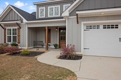 Beautiful 4-bedroom 3.5 bathrooms Waterfront home sitting on 1 on Rocky Branch Golf Club in Georgia - for sale on GolfHomes.com, golf home, golf lot