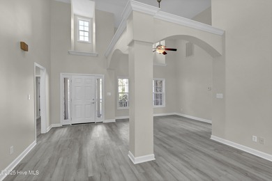 Welcome to this custom-built brick home with an open floor plan on Olde Point Golf and Country Club in North Carolina - for sale on GolfHomes.com, golf home, golf lot