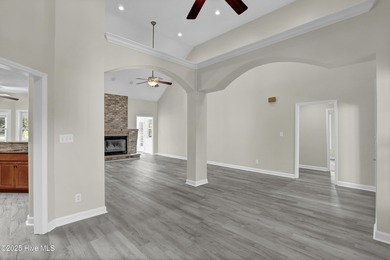 Welcome to this custom-built brick home with an open floor plan on Olde Point Golf and Country Club in North Carolina - for sale on GolfHomes.com, golf home, golf lot