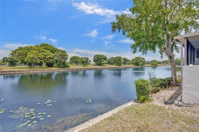 Step into a world of luxury with this rare, expansive corner on Inverrary Country Club in Florida - for sale on GolfHomes.com, golf home, golf lot