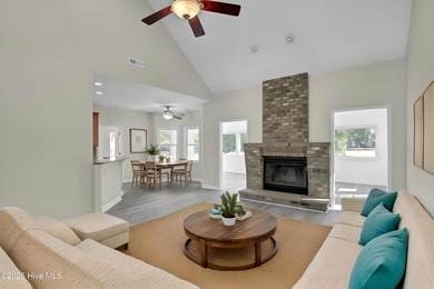 Welcome to this custom-built brick home with an open floor plan on Olde Point Golf and Country Club in North Carolina - for sale on GolfHomes.com, golf home, golf lot