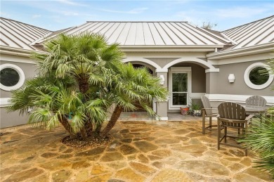 Enter through the beautifully landscaped courtyard and feel the on Rockport Country Club in Texas - for sale on GolfHomes.com, golf home, golf lot