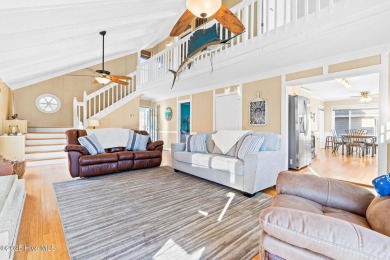 This charming beachfront cottage, located on Newport Street in on Sea Trail Golf Resort in North Carolina - for sale on GolfHomes.com, golf home, golf lot