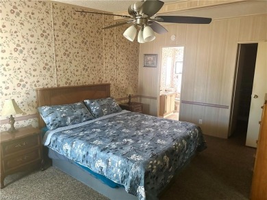 This turnkey two-bedroom, two-bath home is situated on an on Bonita Fairways in Florida - for sale on GolfHomes.com, golf home, golf lot