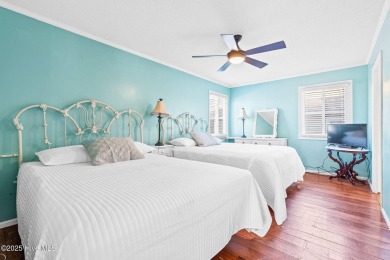 This charming beachfront cottage, located on Newport Street in on Sea Trail Golf Resort in North Carolina - for sale on GolfHomes.com, golf home, golf lot