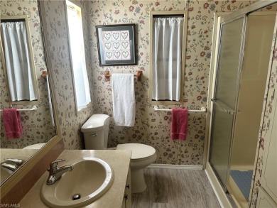 This turnkey two-bedroom, two-bath home is situated on an on Bonita Fairways in Florida - for sale on GolfHomes.com, golf home, golf lot
