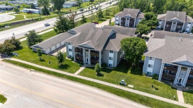 Enjoy top-floor privacy and peaceful views from this pristine on Quail Creek Golf Course in Iowa - for sale on GolfHomes.com, golf home, golf lot