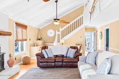 This charming beachfront cottage, located on Newport Street in on Sea Trail Golf Resort in North Carolina - for sale on GolfHomes.com, golf home, golf lot