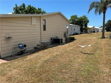 This turnkey two-bedroom, two-bath home is situated on an on Bonita Fairways in Florida - for sale on GolfHomes.com, golf home, golf lot