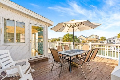 This charming beachfront cottage, located on Newport Street in on Sea Trail Golf Resort in North Carolina - for sale on GolfHomes.com, golf home, golf lot