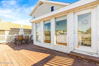 This charming beachfront cottage, located on Newport Street in on Sea Trail Golf Resort in North Carolina - for sale on GolfHomes.com, golf home, golf lot