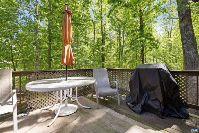 Nestled at the end of a peaceful wooded cul-de-sac in Lake on Lake Monticello Golf Course in Virginia - for sale on GolfHomes.com, golf home, golf lot