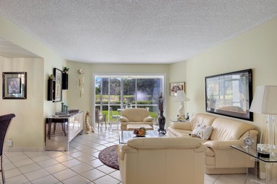 WELCOME TO THIS CONVENIENT 1ST FLOOR CONDO WITH BEAUTIFUL WATER on  in Florida - for sale on GolfHomes.com, golf home, golf lot