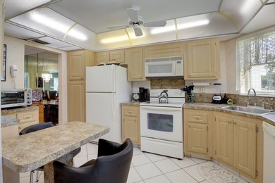 WELCOME TO THIS CONVENIENT 1ST FLOOR CONDO WITH BEAUTIFUL WATER on  in Florida - for sale on GolfHomes.com, golf home, golf lot