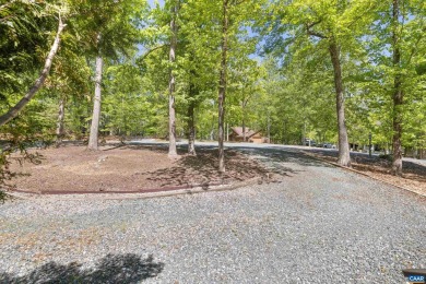 Nestled at the end of a peaceful wooded cul-de-sac in Lake on Lake Monticello Golf Course in Virginia - for sale on GolfHomes.com, golf home, golf lot