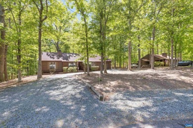 Nestled at the end of a peaceful wooded cul-de-sac in Lake on Lake Monticello Golf Course in Virginia - for sale on GolfHomes.com, golf home, golf lot