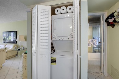 WELCOME TO THIS CONVENIENT 1ST FLOOR CONDO WITH BEAUTIFUL WATER on  in Florida - for sale on GolfHomes.com, golf home, golf lot