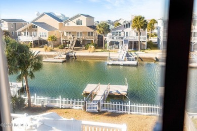 This charming beachfront cottage, located on Newport Street in on Sea Trail Golf Resort in North Carolina - for sale on GolfHomes.com, golf home, golf lot