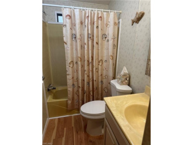 This turnkey two-bedroom, two-bath home is situated on an on Bonita Fairways in Florida - for sale on GolfHomes.com, golf home, golf lot