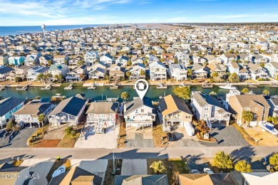 This charming beachfront cottage, located on Newport Street in on Sea Trail Golf Resort in North Carolina - for sale on GolfHomes.com, golf home, golf lot