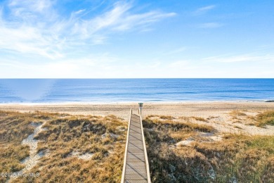 This charming beachfront cottage, located on Newport Street in on Sea Trail Golf Resort in North Carolina - for sale on GolfHomes.com, golf home, golf lot