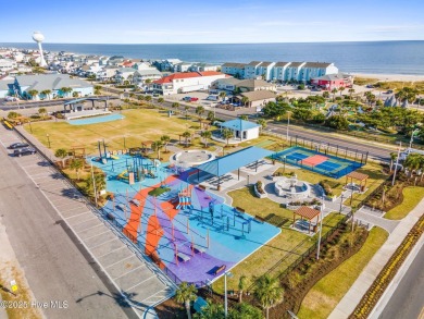 This charming beachfront cottage, located on Newport Street in on Sea Trail Golf Resort in North Carolina - for sale on GolfHomes.com, golf home, golf lot