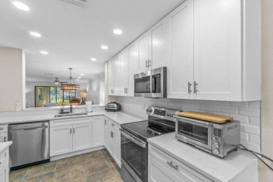 Experience the epitome of modern elegance in this fully on Hunters Run Golf and Country Club in Florida - for sale on GolfHomes.com, golf home, golf lot