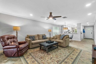 Experience the epitome of modern elegance in this fully on Hunters Run Golf and Country Club in Florida - for sale on GolfHomes.com, golf home, golf lot