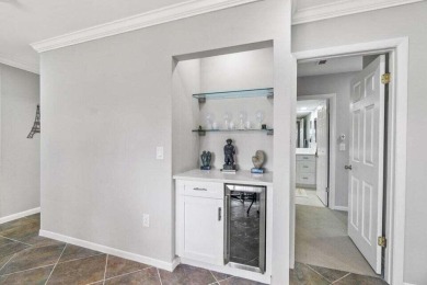 Experience the epitome of modern elegance in this fully on Hunters Run Golf and Country Club in Florida - for sale on GolfHomes.com, golf home, golf lot